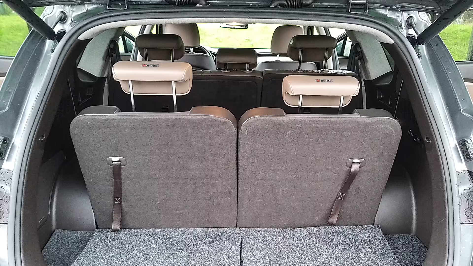 Spacious car interior with ample luggage space for Porto to Tomar private transfer service.