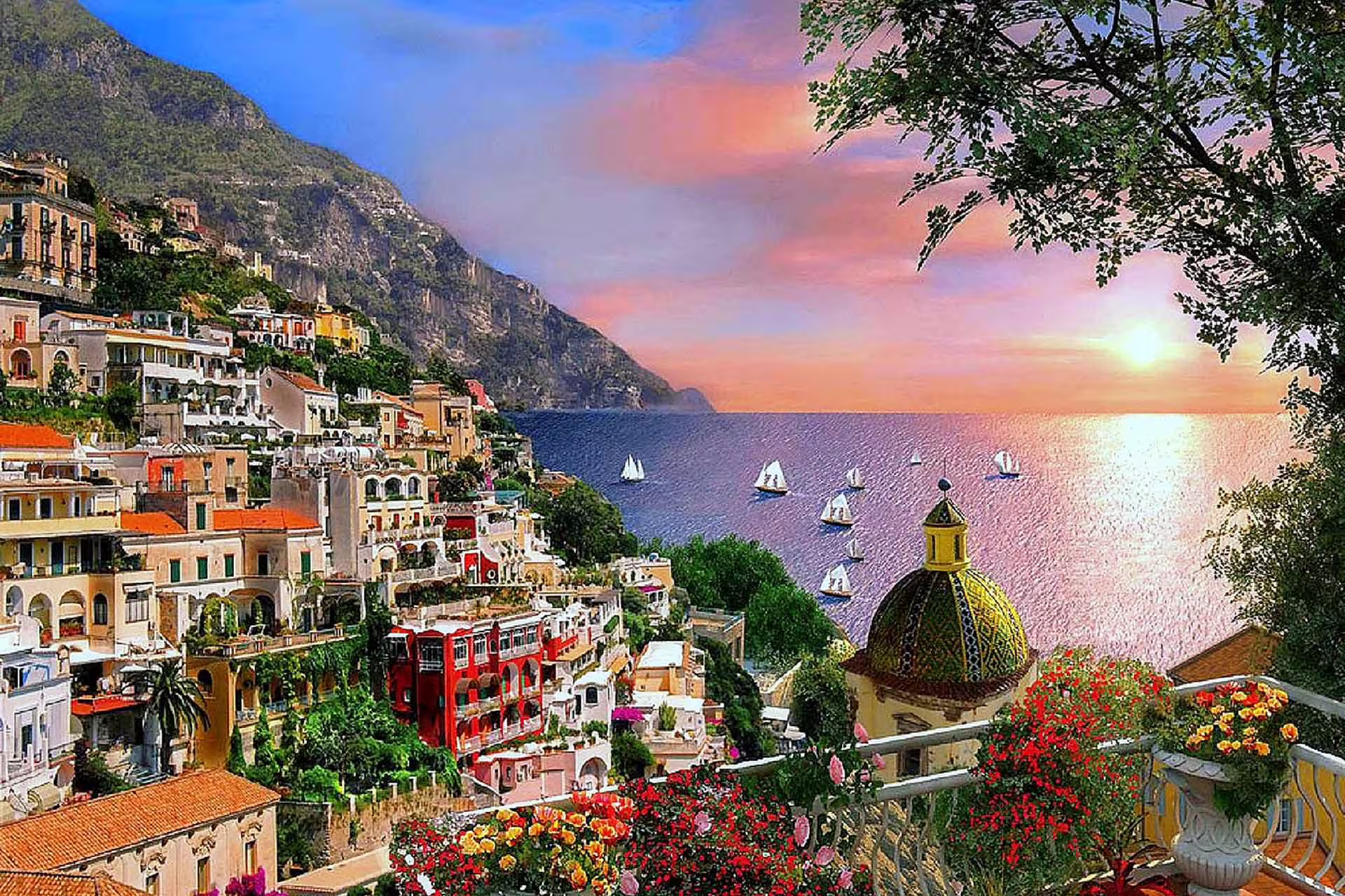 Colorful Positano cliffside with boats on the sea at sunset during a sharing minivan tour.