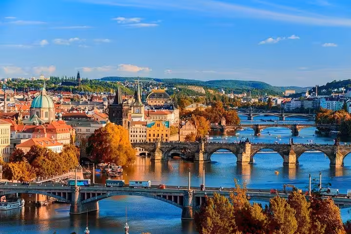 Prague skyline with Charles Bridge and Vltava River, highlight of a private day trip from Vienna