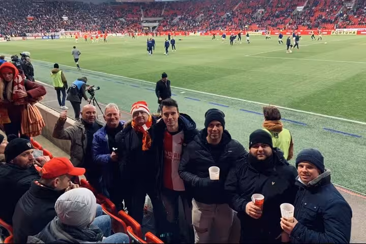 Fans with local host at Prague football match, Slavia or Sparta Prague game day experience with stadium seats
