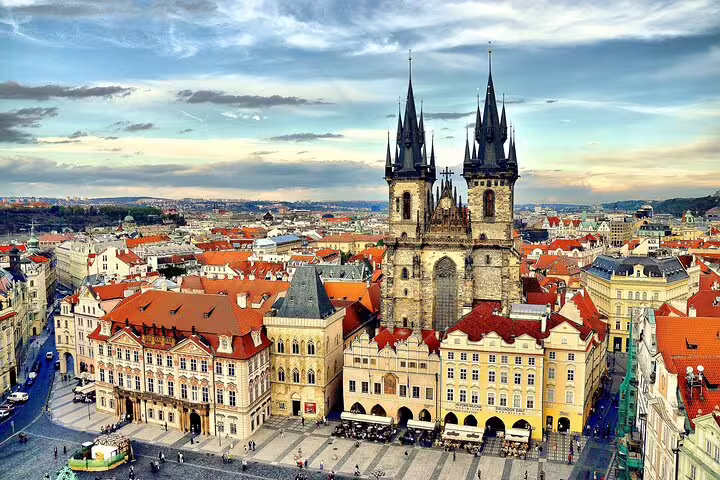 Aerial view of Prague Old Town Square with Church of Our Lady before Týn and red-roofed historic buildings