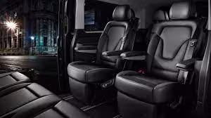 Luxurious black leather captain seats inside a premium private van for Iceland South Coast full-day guided tours