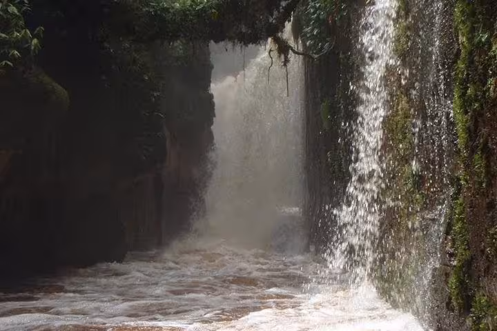 Waterfall curtain in lush Amazon jungle, Presidente Figueiredo waterfall circuit tour near Manaus, Brazil