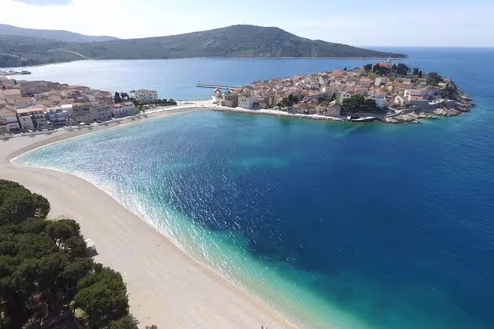 Aerial view of Primosten Beach lagoon and old town, turquoise Adriatic water on a perfect shore excursion