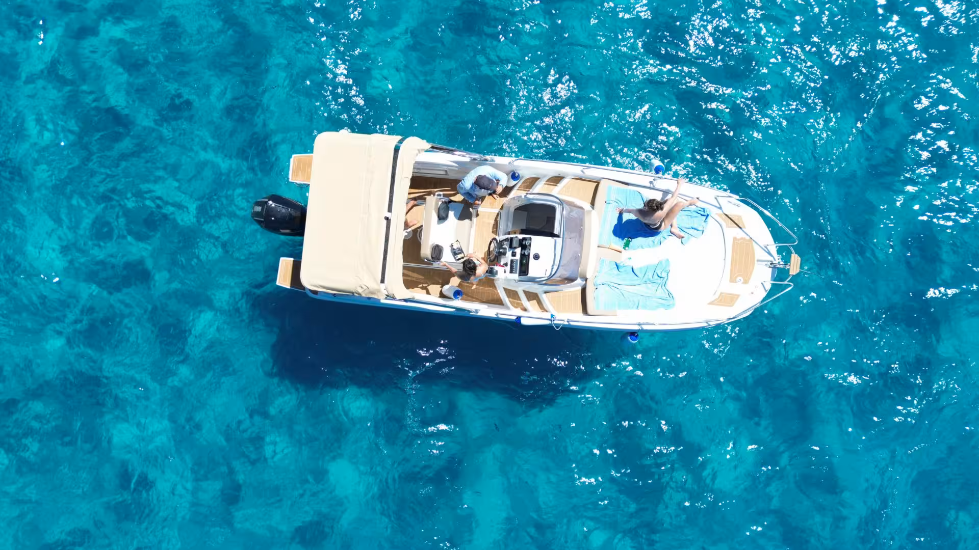 Enjoy a luxurious private boat tour from Villasimius, cruising over vibrant blue waters in Sardinia.
