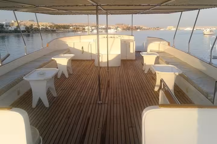 Spacious shaded sundeck seating on private boat trip from Hurghada to Soma Bay, Safaga, and Makadi Bay