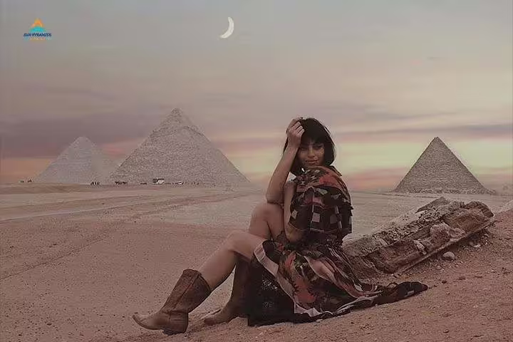 Traveler at Giza Pyramids at sunset, Cairo day trip from Hurghada by flight with private guide