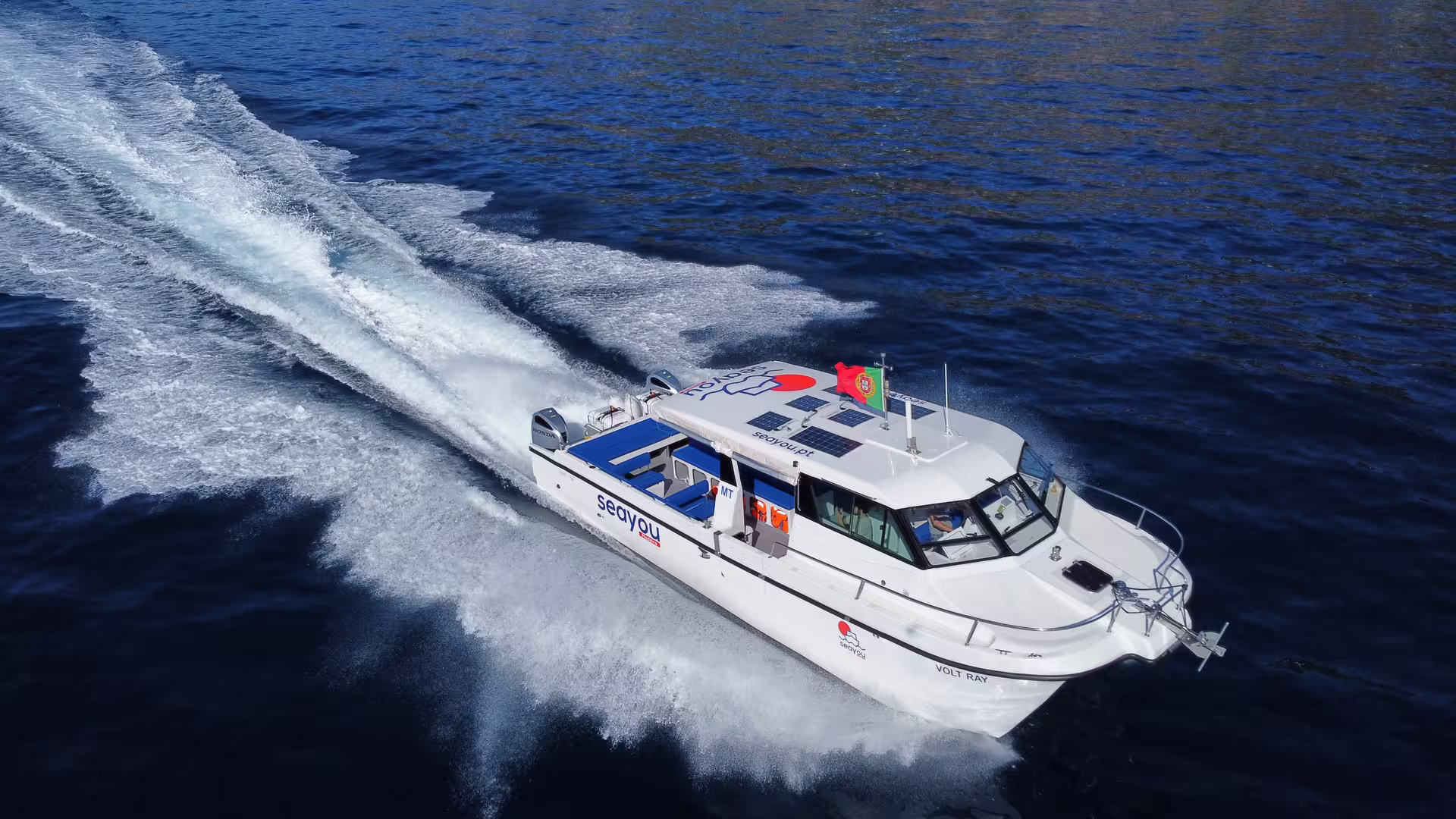 Private cruise boat speeding through ocean waters, offering an exhilarating adventure escape.
