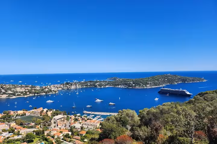 Aerial view of French Riviera with cruise ships and yachts during a private excursion stopover.