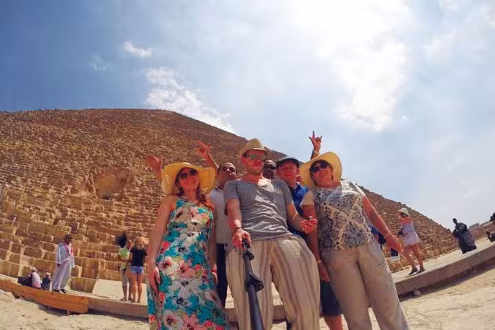 Group photo at the Great Pyramid of Giza during a private day tour to Cairo from Soma Bay and Hurghada