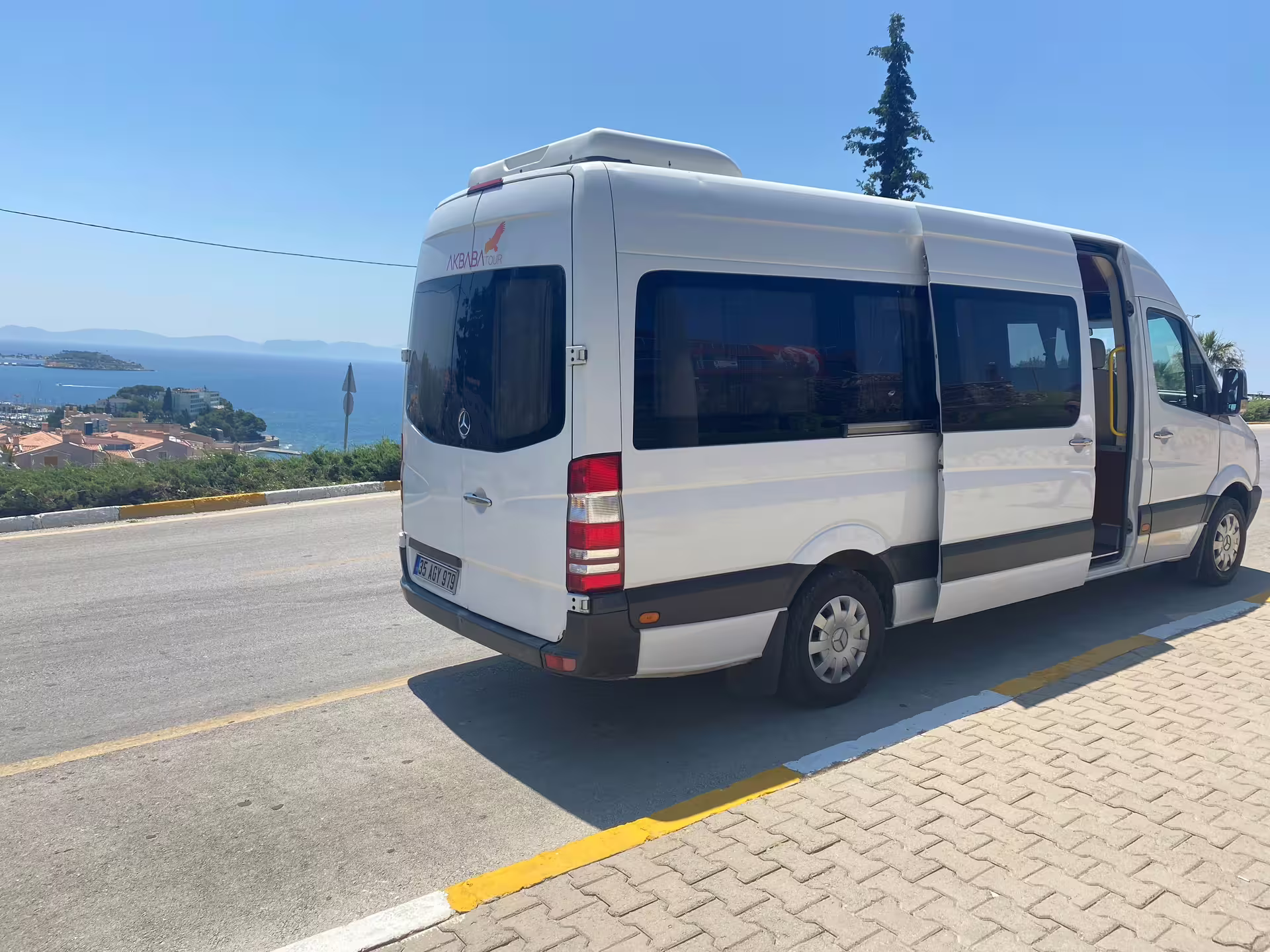 Private tour van for all-inclusive Ephesus and House of Virgin Mary with lunch, scenic Kusadasi coastline view
