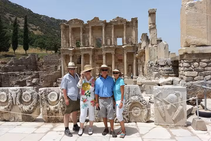 Private Ephesus shore excursion from Kusadasi with guests posing at the Library of Celsus ruins