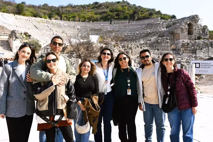 Private Ephesus tour from Bodrum group photo at the ancient Odeon theater ruins in Ephesus, Turkey