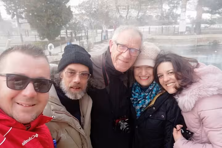 Cruise shore excursion group photo on private Ephesus tour, relaxing at Pamukkale thermal pools