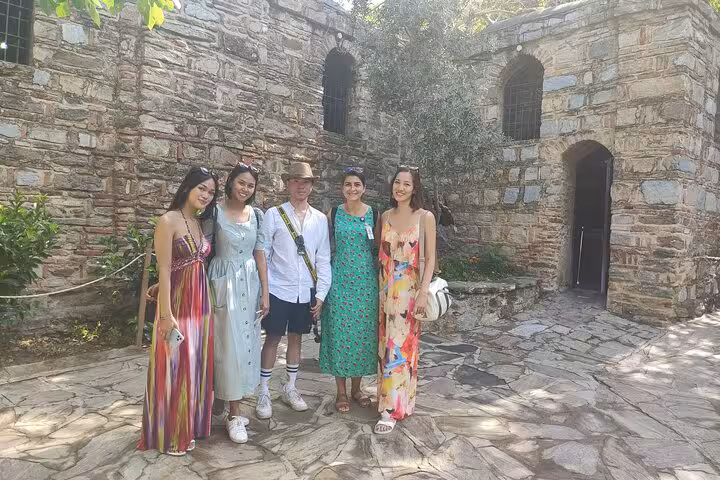 Private Ephesus tour guests at the House of Virgin Mary courtyard, guided day trip from Cesme or Alacati