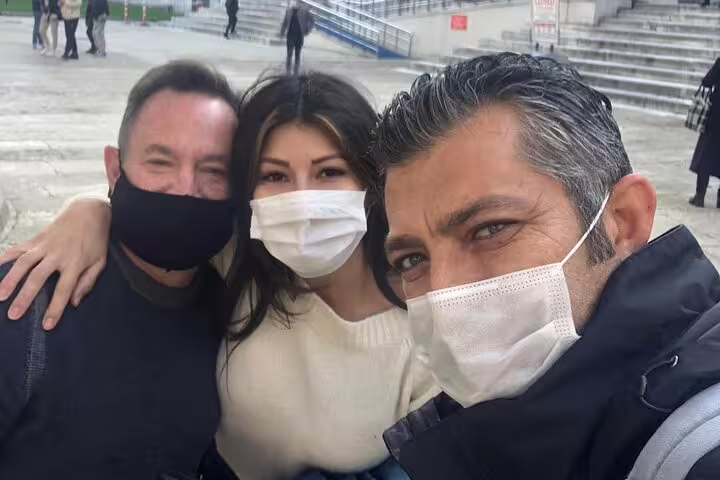 Tourists wearing masks enjoying a private guided tour experience in Istanbul.