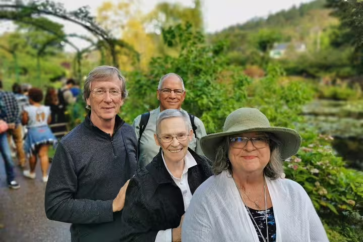 Small group in Monet’s Giverny gardens on a private guided day tour from Paris with hotel pickup