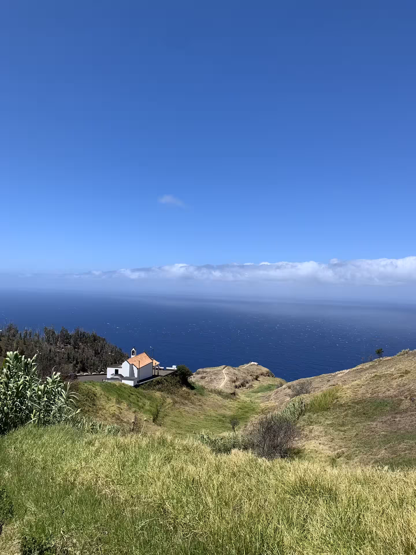 Exclusive private guided tour stop at a charming Madeira hilltop chapel overlooking the Atlantic Ocean