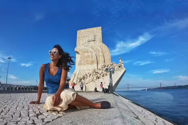 Enjoy a private Lisbon city tour featuring the iconic Monument to the Discoveries with breathtaking river views and vibrant atmosphere.