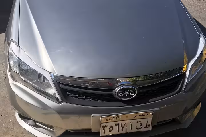 BYD sedan used for private Luxor International Airport transfer, reliable air-conditioned pickup in Luxor