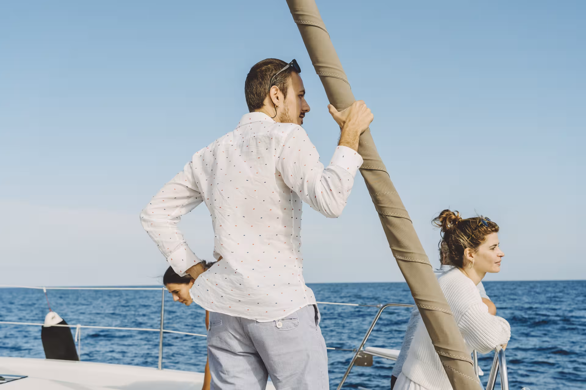 Guests enjoying sea views on a private Bali 4.1 luxury catamaran cruise from Barcelona along the Mediterranean