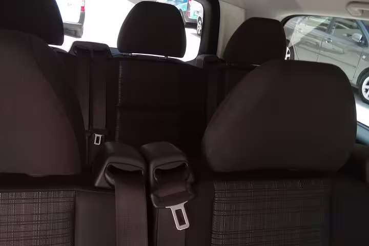Comfortable rear seats inside private minivan for Athens to Ancient Olympia transfer, spacious air-conditioned ride