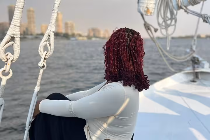 Guest relaxing on private Nile boat deck in Cairo, ideal for birthday cruise with lunch or dinner