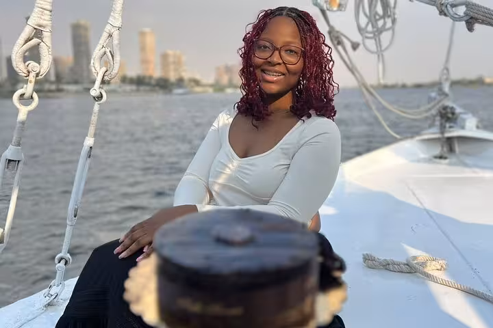 Smiling guest on private Nile boat cruise in Cairo, perfect birthday celebration with lunch or dinner