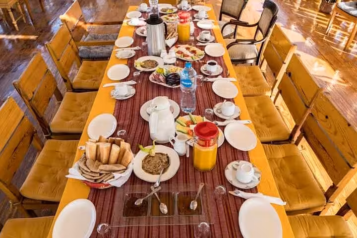 Dining table set for breakfast on a private Nile cruise, 7 days 6 nights from Luxor to Aswan