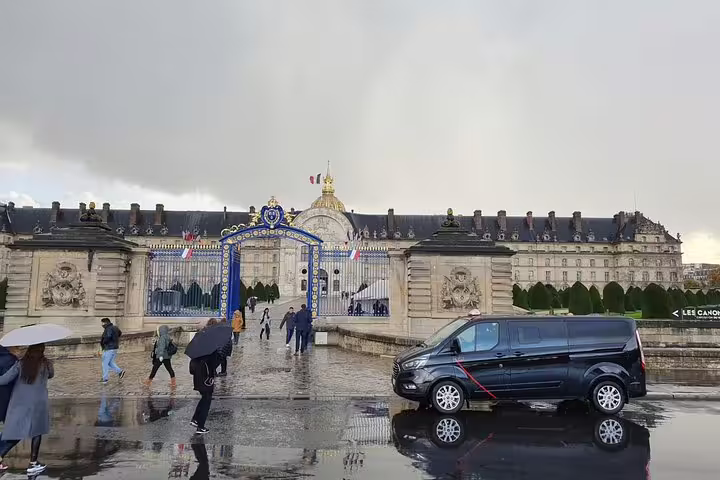 Private driver van parked by Les Invalides entrance in Paris, ideal for half-day private sightseeing tour