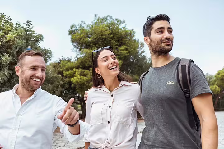 Travelers with local guide on a Paris half-day private sightseeing tour, exploring highlights with a driver