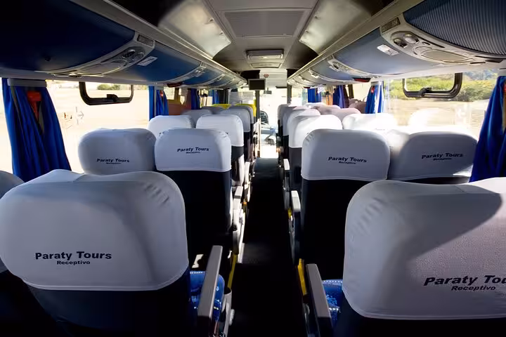 Spacious interior of a private shuttle with comfortable seating from Rio de Janeiro to Buzios by Paraty Tours.