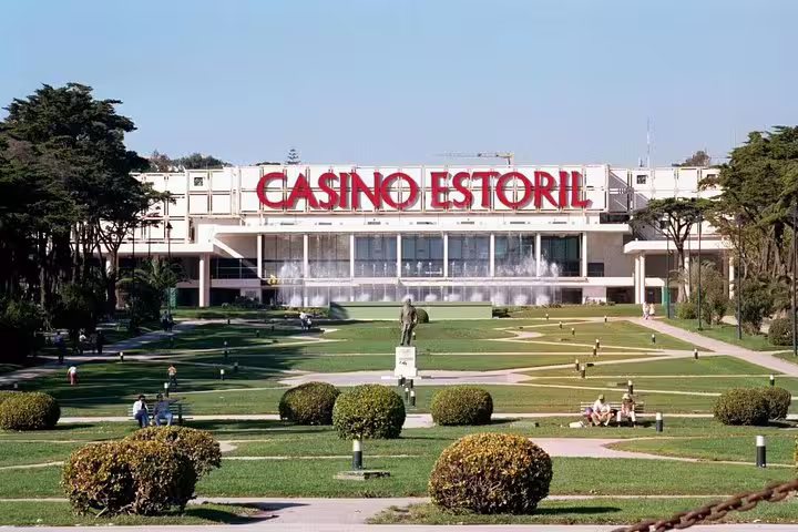 Experience a private Sintra tour with a visit to the iconic Casino Estoril, surrounded by lush gardens and vibrant architecture.
