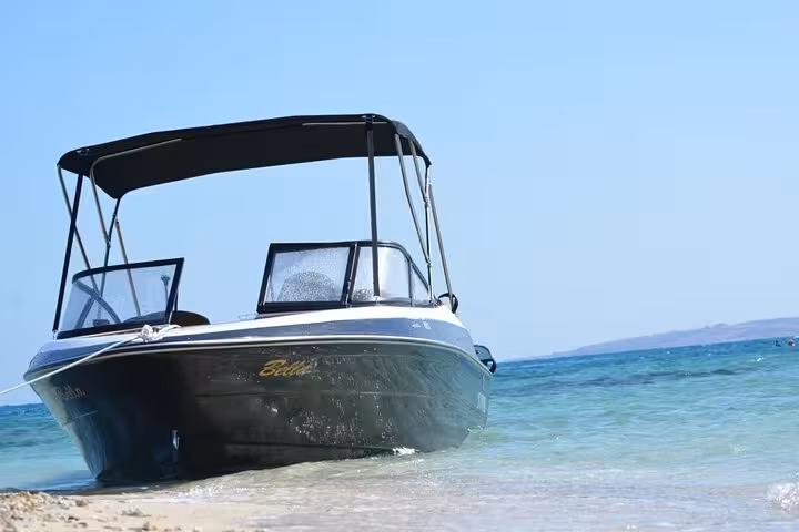 Private speedboat on the shore in Hurghada, Red Sea transfer to Mahmya Island with lunch included