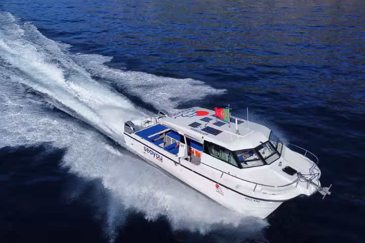 Private sunset cruise offering 2.5-hour tours with free WiFi, bar access, and activities for up to 18 guests.