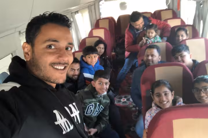 Travel group selfie on private tour minibus for 3 days Cairo Giza Alexandria pyramids and local food