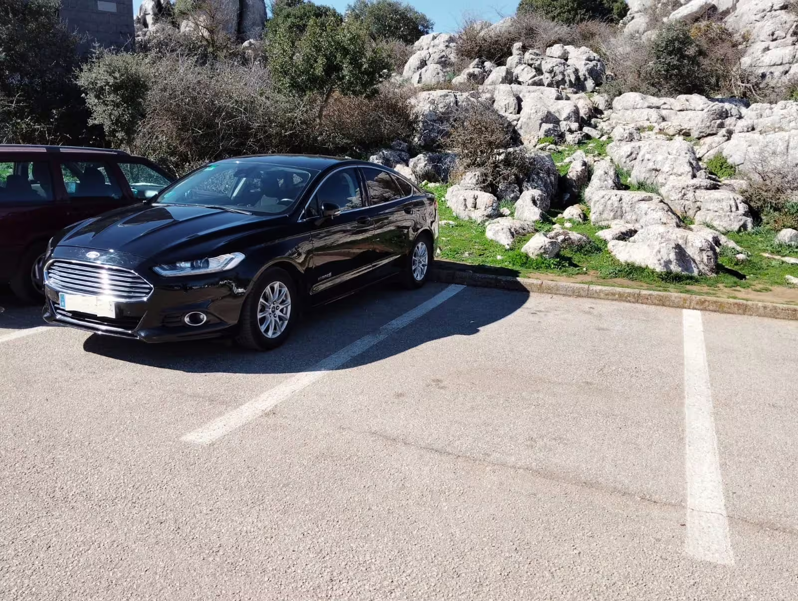 Private transfer car parked at El Torcal de Antequera, transport for Antequera and El Torcal trip from Costa del Sol