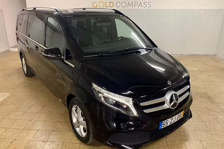 Luxurious black Mercedes van for private transfer from Lisbon to Algarve, offering comfort and style for your journey.