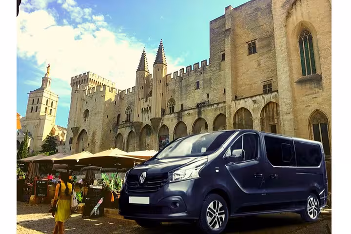 Private transfer Marseille to Avignon minivan parked by Palais des Papes in Avignon, Provence chauffeur service