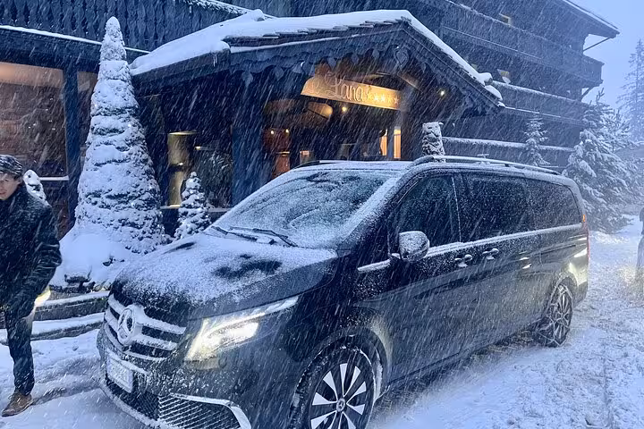 Luxury vehicle in snowy conditions ready for private transfer service from Milan to Zermatt, ensuring comfort and safety.