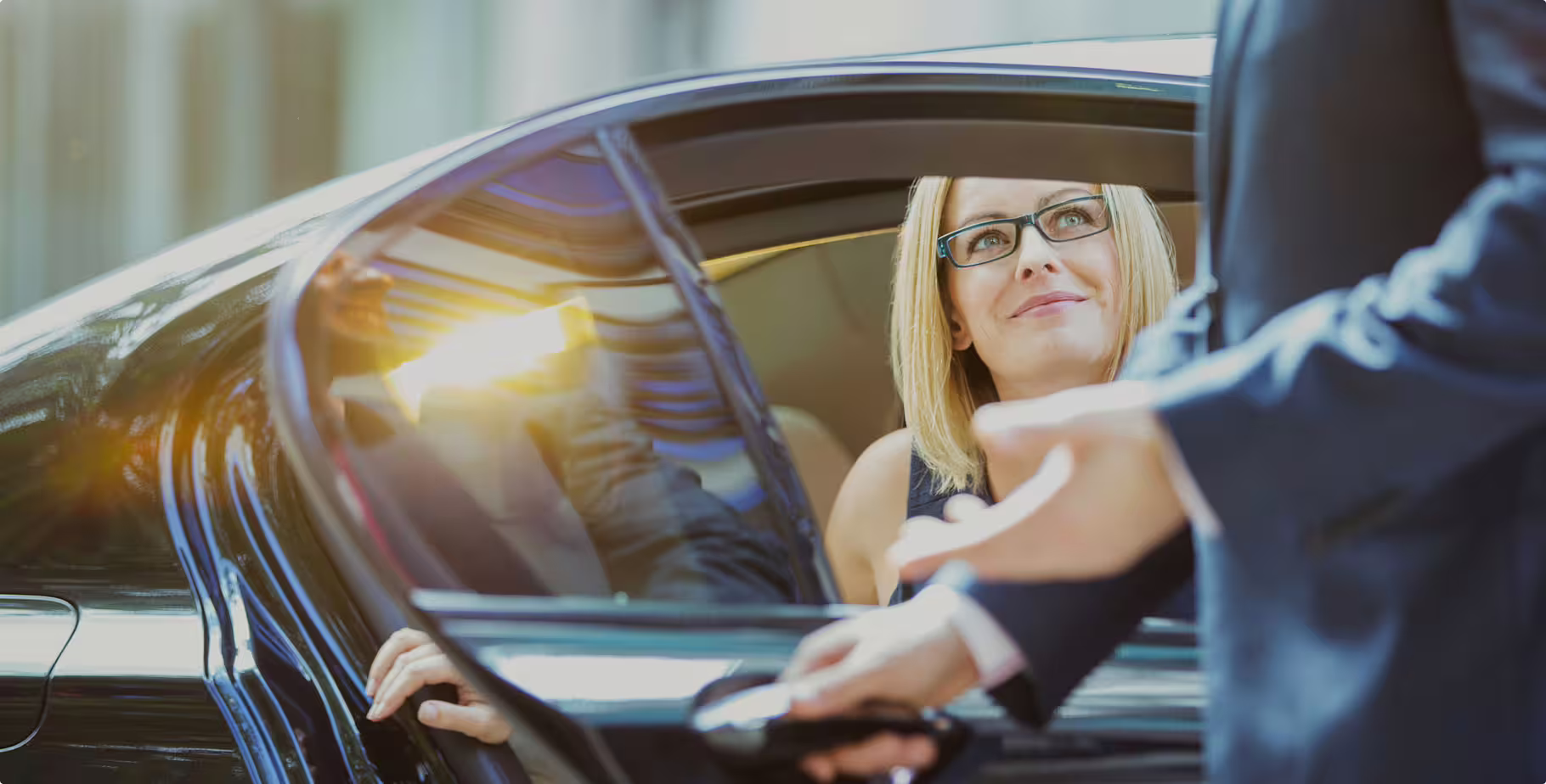 Passenger greeted by chauffeur in executive car for private transfer Naples to Caserta, comfortable door-to-door ride