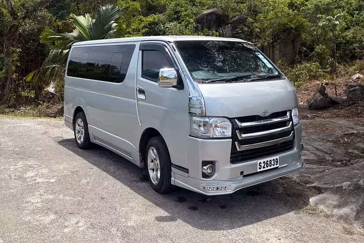 Comfortable private transfer van in Seychelles ready for scenic island tours and airport pickups.