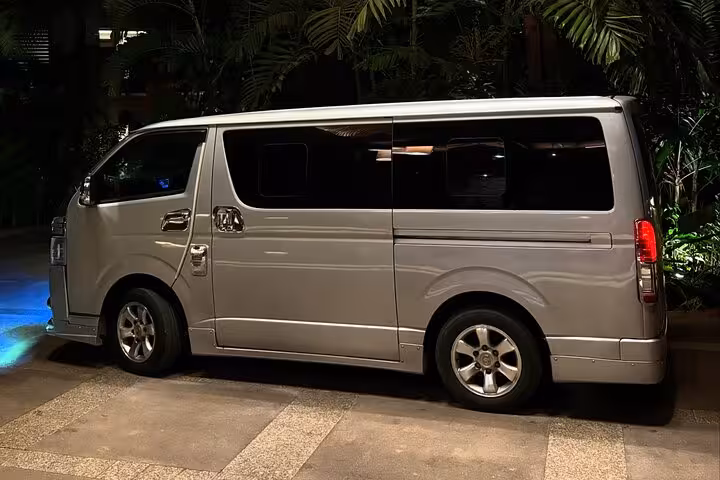 Luxurious private transfer van in Seychelles, offering comfortable and reliable transportation for tourists.