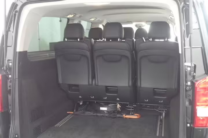 Spacious interior of a private transfer van for airport to hotel services in Mestre and Marghera, Venice.