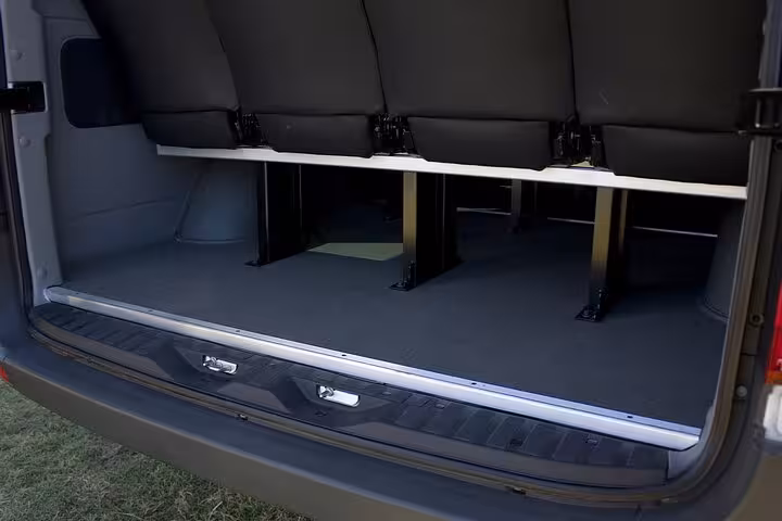 Spacious interior of private transport van for Búzios to Rio de Janeiro transfer, perfect for luggage and comfort.