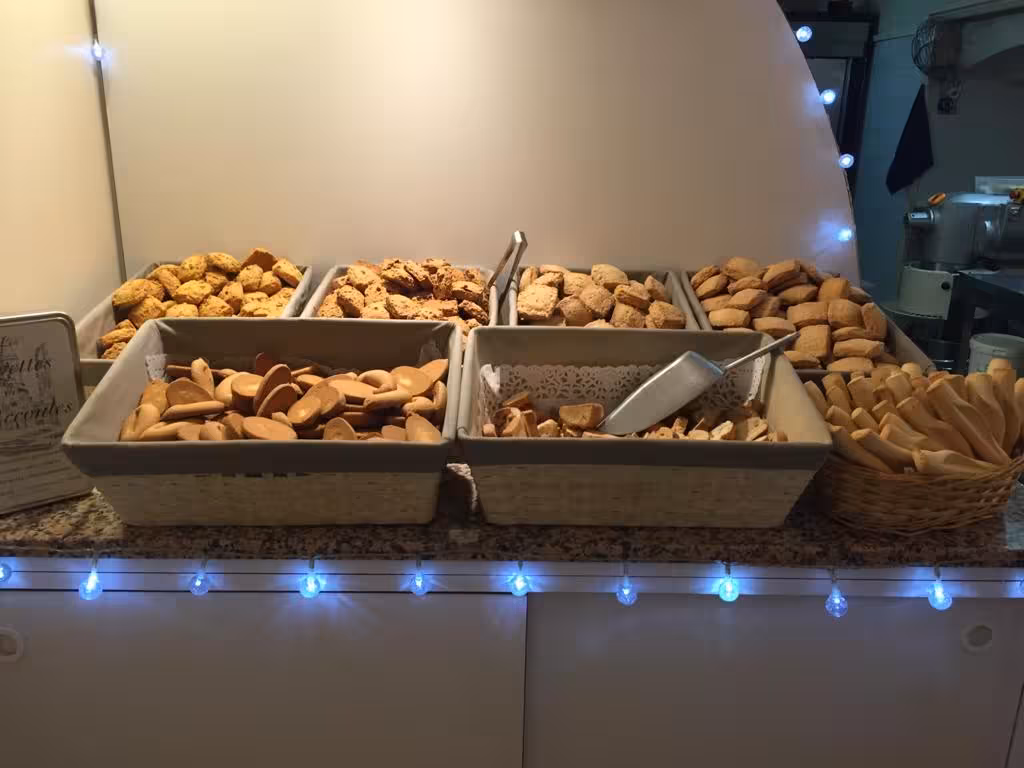Assorted Provençal cookies and navettes on display, sweet stop on a Marseille food tour tasting