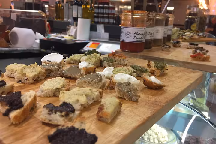 Provençal market tasting board with tapenade and spreads, a gourmet stop on Avignon wine tour