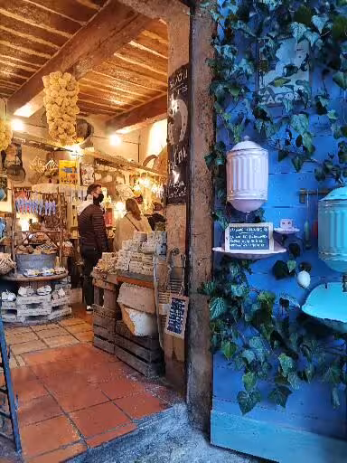Provence artisan shop interior with local goods and decor, cultural stop on 11-day Christian heritage tour