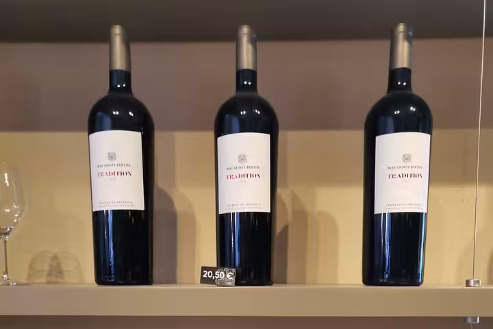Bottles of Provence red wine on display, a tasting stop on the Baux and Saint Rémy de Provence tour