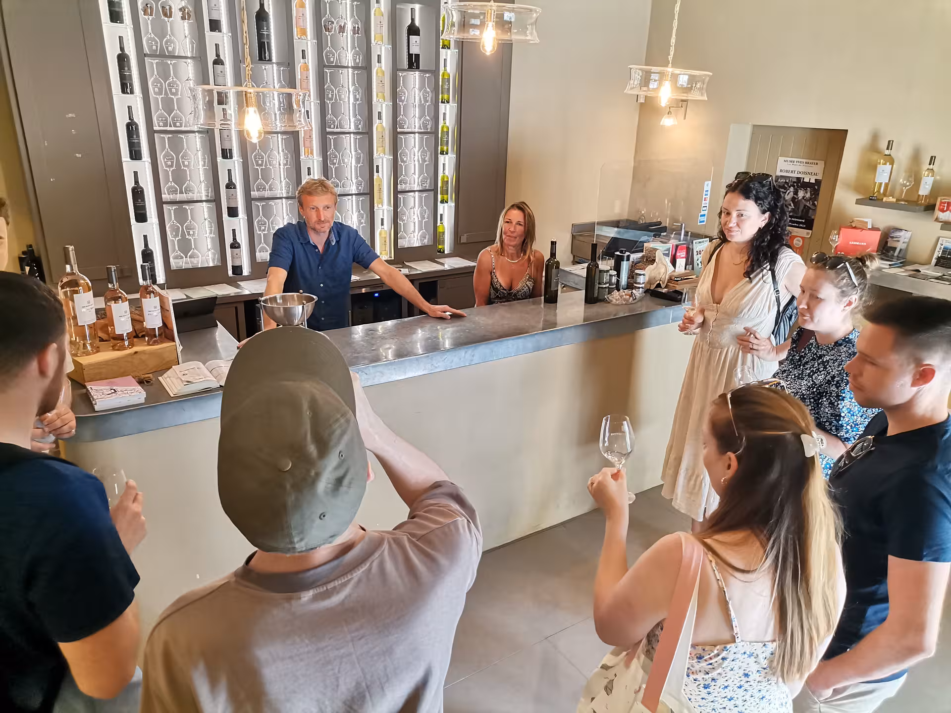 Wine tasting in Provence cellar near Arles, guests sampling local reds and rosés on Les Baux tour
